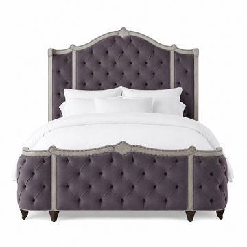 A luxury upholstered bed featuring a tall, tufted headboard and matching footboard in a dusty purple fabric with brushed nickel tacks.  Made in the United States and fully customizable 